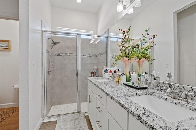 747 Fraser Ct, Kissimmee, FL 34759 - full bath with a sink, a shower stall, and double vanity