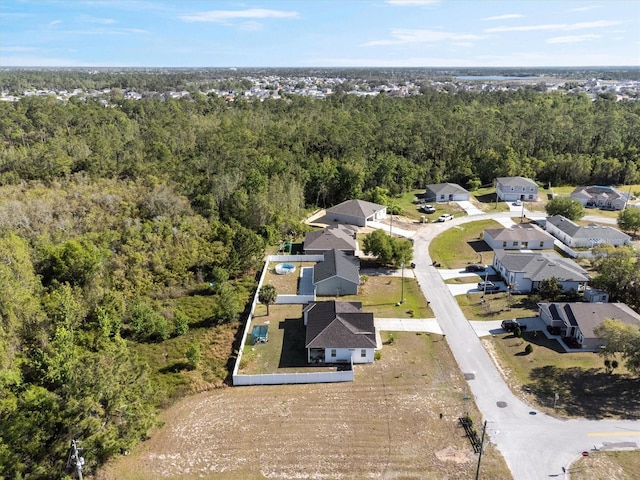 747 Fraser Ct, Kissimmee, FL 34759 - birds eye view of property with a residential view and a wooded view