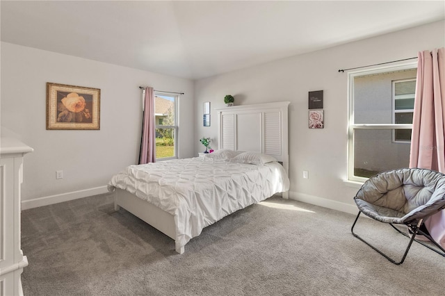 carpeted bedroom with baseboards