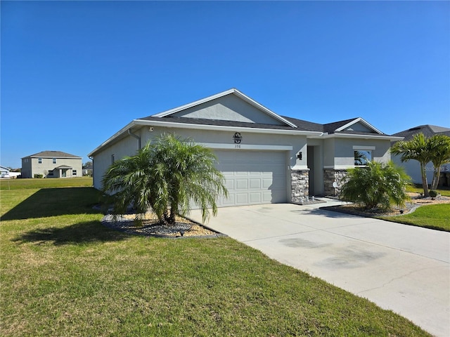 ranch-style home with a front yard, driveway, an attached garage, stucco siding, and stone siding