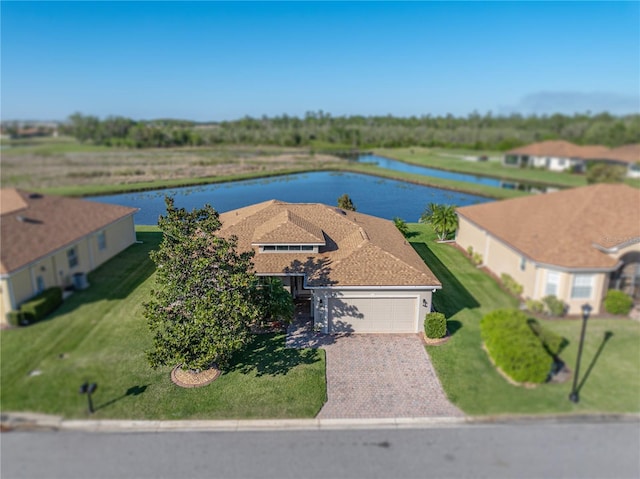 bird's eye view with a water view