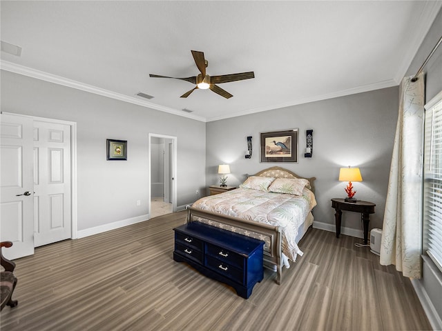 bedroom with visible vents, a ceiling fan, crown molding, and baseboards