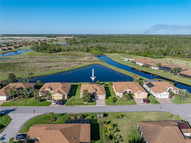 aerial view featuring a residential view and a water view