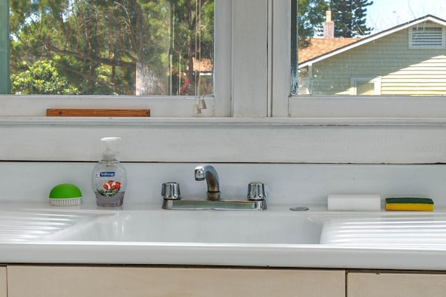 room details with a sink and light countertops