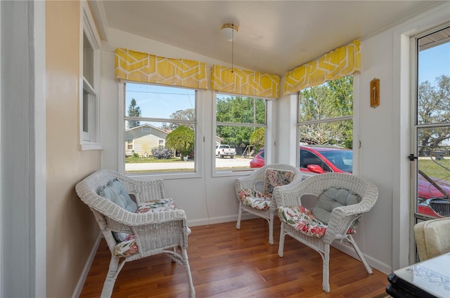 sunroom / solarium featuring a healthy amount of sunlight
