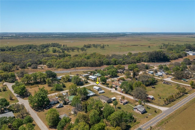 birds eye view of property featuring a rural view