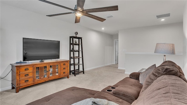 carpeted living area featuring recessed lighting, baseboards, visible vents, and ceiling fan