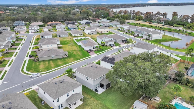 aerial view with a residential view and a water view