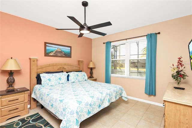 bedroom with light tile patterned floors, ceiling fan, and baseboards