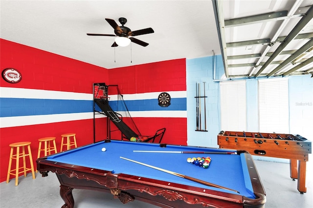 rec room with pool table, concrete flooring, and ceiling fan