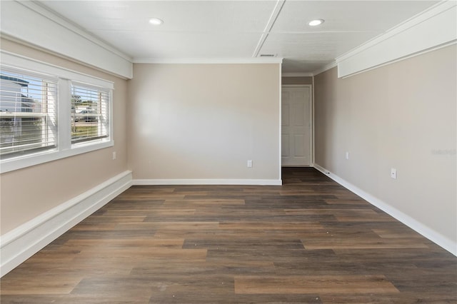 unfurnished room with visible vents, crown molding, baseboards, recessed lighting, and dark wood-style flooring