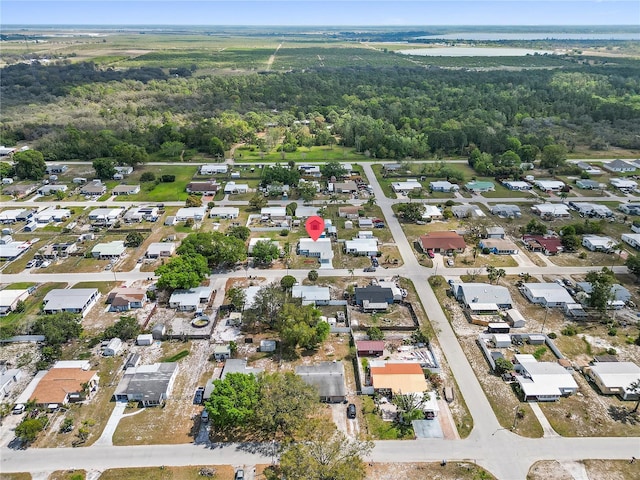 aerial view with a forest view and a residential view