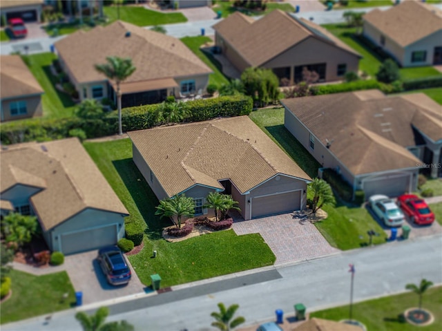 birds eye view of property with a residential view