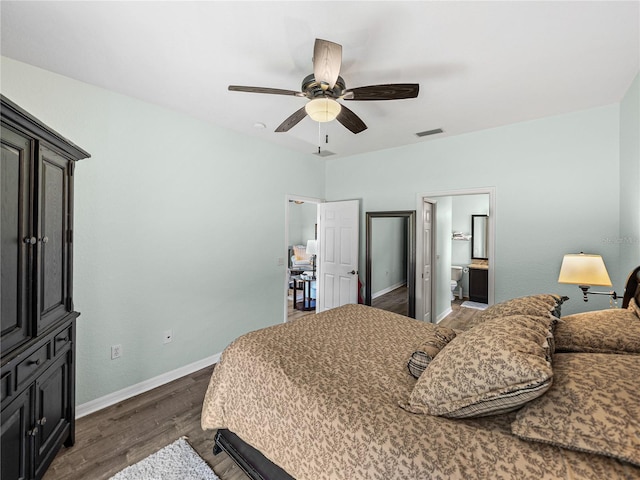bedroom with visible vents, baseboards, connected bathroom, a ceiling fan, and dark wood finished floors