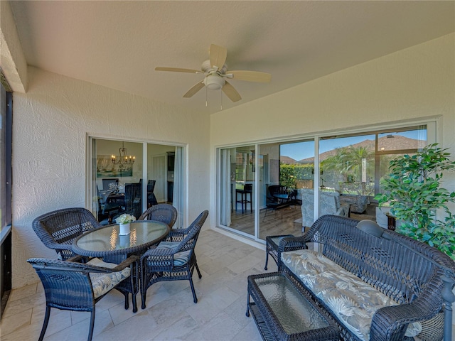 view of patio featuring outdoor dining space and ceiling fan