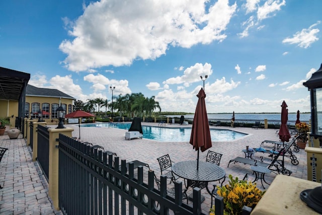 community pool featuring a patio area