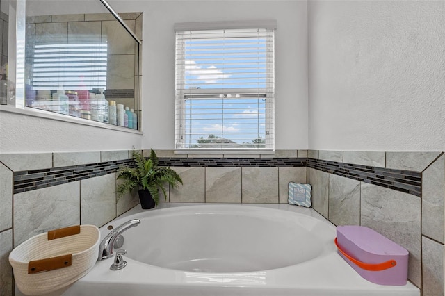 bathroom featuring a bath