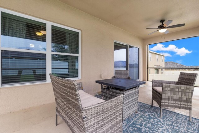 view of patio / terrace with outdoor lounge area and ceiling fan