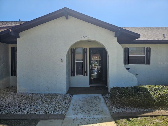 4529 Mercado Dr, Sebring, FL 33872 - property entrance with stucco siding