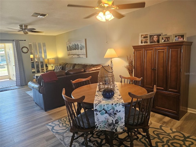 4529 Mercado Dr, Sebring, FL 33872 - dining space featuring ceiling fan, visible vents, and light wood-type flooring
