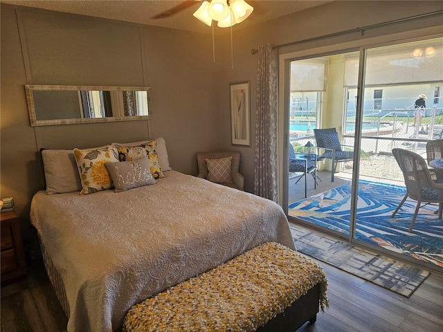 4529 Mercado Dr, Sebring, FL 33872 - bedroom with access to exterior, wood finished floors, and ceiling fan