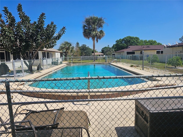 4529 Mercado Dr, Sebring, FL 33872 - community pool with a patio area and fence