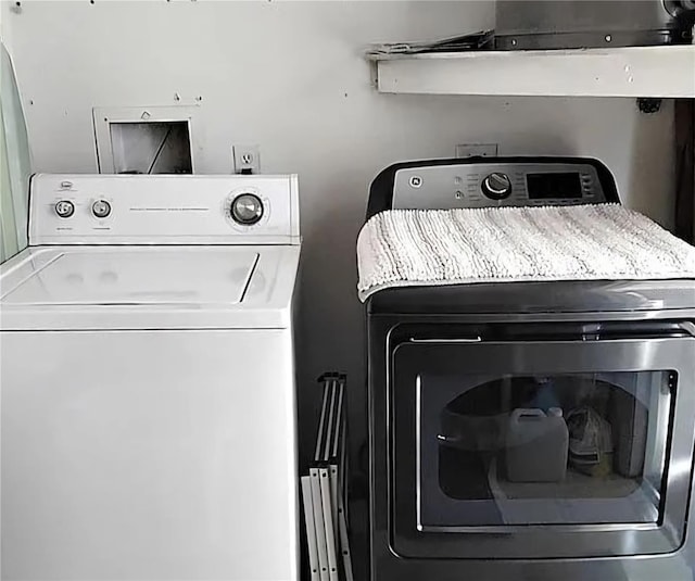 4529 Mercado Dr, Sebring, FL 33872 - clothes washing area with laundry area and separate washer and dryer