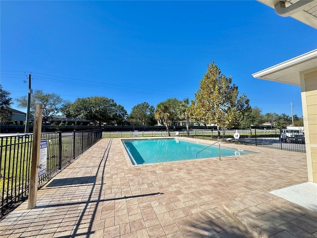 169 Summershore Dr, Auburndale, FL 33823 - community pool featuring a patio area
