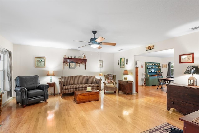5020 Broadmore Dr, Auburndale, FL 33823 - living area with light wood-style floors and a ceiling fan