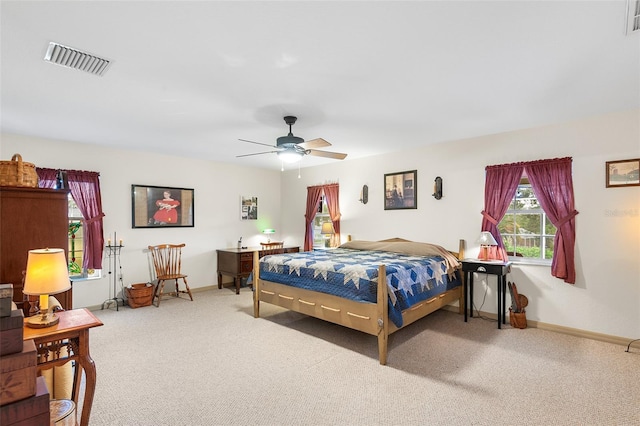 5020 Broadmore Dr, Auburndale, FL 33823 - bedroom with carpet, baseboards, and a ceiling fan