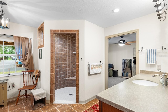 5020 Broadmore Dr, Auburndale, FL 33823 - full bath with a walk in shower, vanity, baseboards, and a ceiling fan