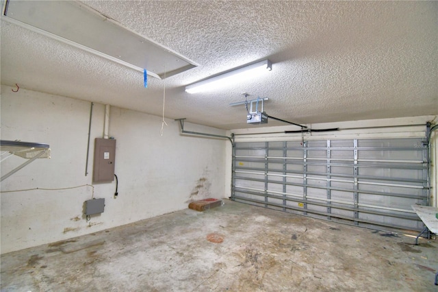 garage featuring a garage door opener and electric panel