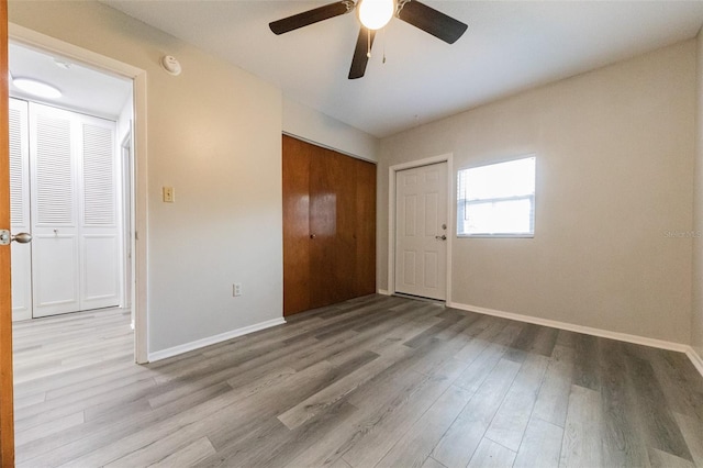 1801 3rd Ct SE, Winter Haven, FL 33880 - unfurnished bedroom with wood finished floors and baseboards