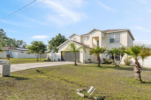 247 Cobalt Dr, Kissimmee, FL 34758 - traditional-style house featuring driveway, fence, stucco siding, and a front lawn