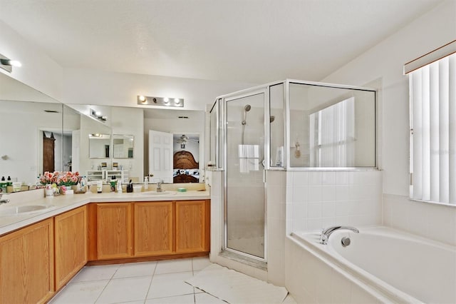 247 Cobalt Dr, Kissimmee, FL 34758 - full bathroom with a stall shower, a garden tub, double vanity, and a sink