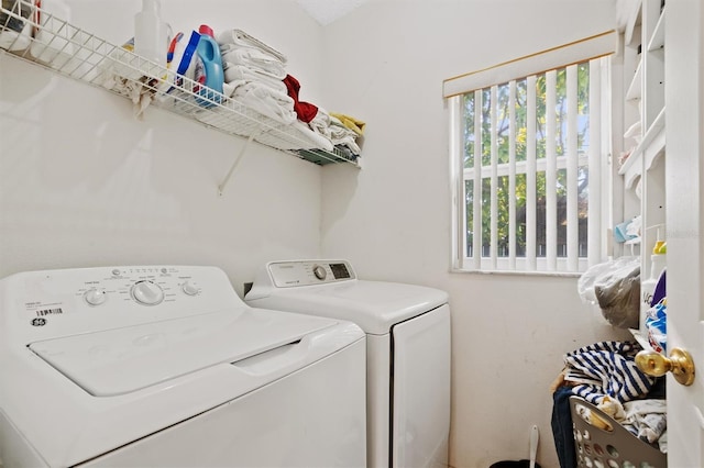 247 Cobalt Dr, Kissimmee, FL 34758 - laundry room with washing machine and dryer and laundry area