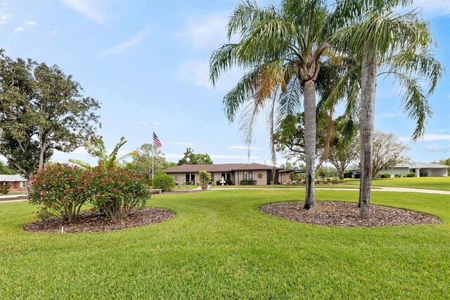 view of front of house with a front lawn