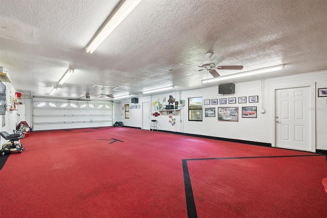 garage with a ceiling fan