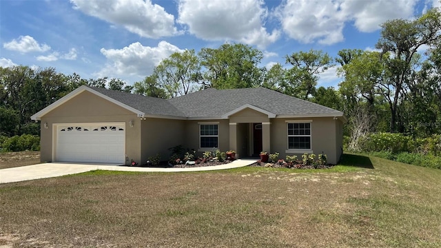 214 Brook Ln, Polk City, FL 33868 - ranch-style home featuring a garage, driveway, stucco siding, and a front lawn