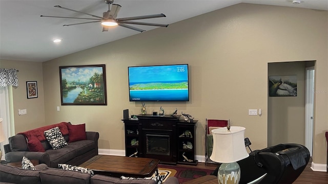 214 Brook Ln, Polk City, FL 33868 - living area with baseboards, vaulted ceiling, ceiling fan, and dark wood-type flooring