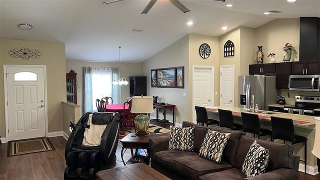 214 Brook Ln, Polk City, FL 33868 - living area featuring dark wood-style floors, baseboards, ceiling fan, and visible vents