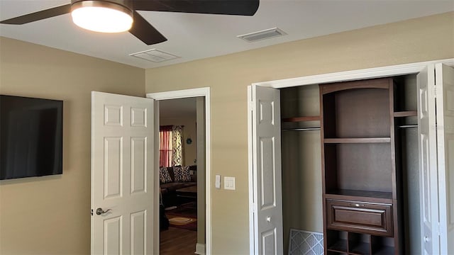 214 Brook Ln, Polk City, FL 33868 - bedroom featuring visible vents, a closet, and a ceiling fan