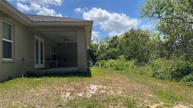 214 Brook Ln, Polk City, FL 33868 - view of yard with french doors and a ceiling fan