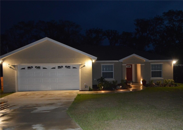 214 Brook Ln, Polk City, FL 33868 - ranch-style house with stucco siding, a garage, and concrete driveway