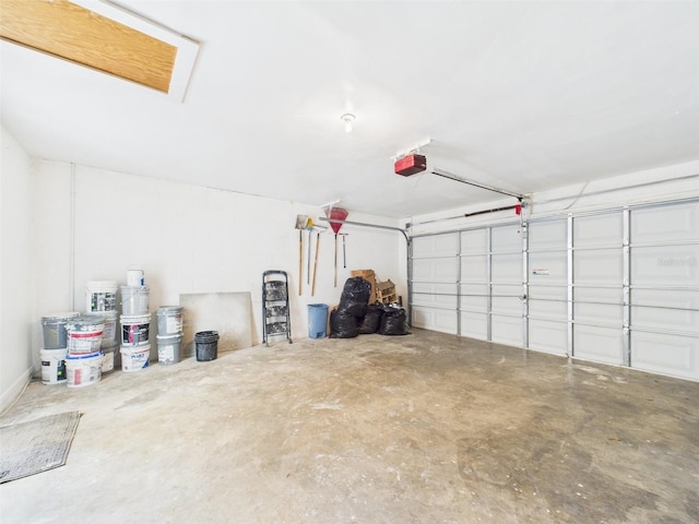 garage featuring a garage door opener