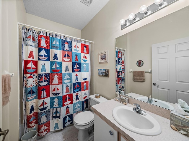bathroom featuring a textured ceiling, visible vents, toilet, tile patterned floors, and vanity
