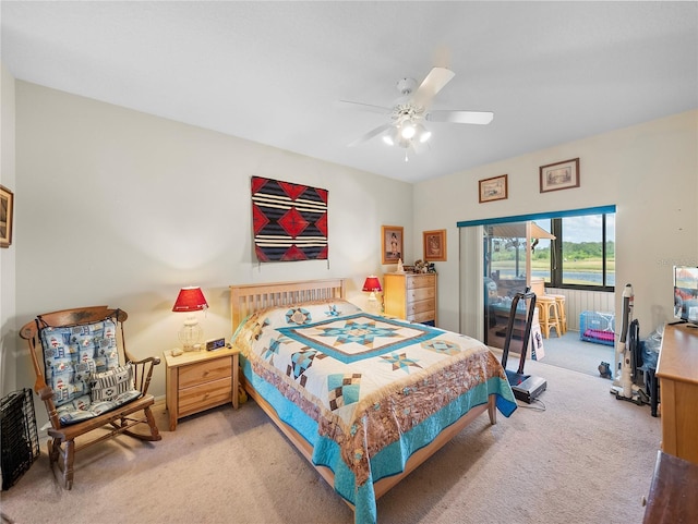 bedroom featuring a ceiling fan and light colored carpet