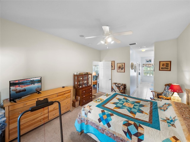 bedroom featuring visible vents and a ceiling fan