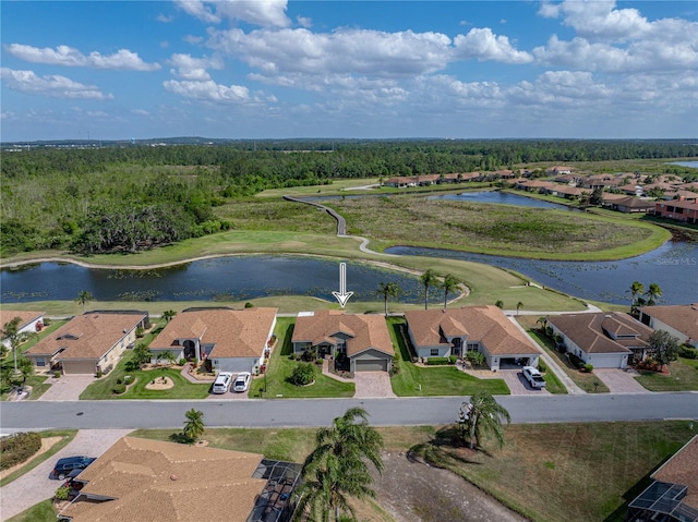 bird's eye view featuring a residential view and a water view