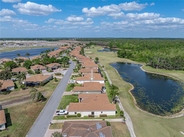 aerial view featuring a residential view and a water view